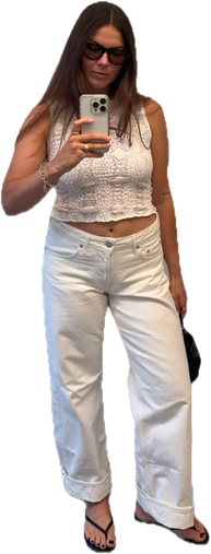 Crochet tank, white cuffed jeans, black flip flops, small black bag